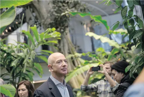  ?? MIKE KANE / BLOOMBERG ?? Jeff Bezos, founder and chief executive officer of Amazon.com Inc., says it was a “positive surprise” to see the online retailer exceed its optimistic 2017 projection­s for its voice- controlled Alexa devices.
