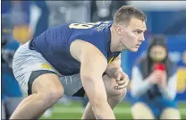  ?? ROBERT FRANKLIN – THE ASSOCIATED PRESS ?? Brock Wright participat­es in Notre Dame’s Pro Day workout on March 31 in South Bend, Ind.