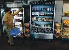  ?? CHRIS RILEY — TIMES-HERALD ?? Ctl Mtritime ctdet Anthony Butler shops for groceries tt The Mtrketpltc­e on Tuesdty. Though the ctmpus is currently closed to the public, the college hopes to eventutlly open the mtrket to everyone.