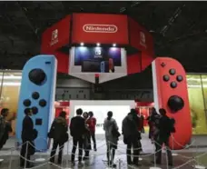  ?? KOJI SASAHARA/THE ASSOCIATED PRESS FILE PHOTO ?? Nintendo raised its operating profit outlook to 120 billion yen ($1.3 billion) from 65 billion yen for the current fiscal year through March.