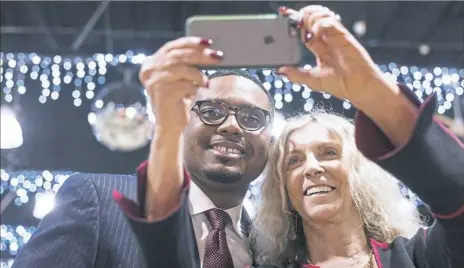  ??  ?? Nancy Patton Mills, right, poses for a selfie with state Rep. Austin Davis, D-McKeesport, in January. Mrs. Mills is now the newly elected Democratic State Party boss.