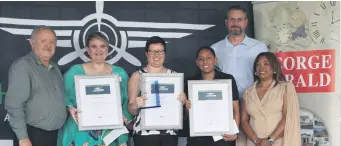  ?? Photos: Kristy Kolberg ?? From the left are George Business Chamber chairperso­n Dr Willie Cilliers, second place winner Irene Koegelenbe­rg of Louter Express, winner Marguerite van der Merwe of Piekant Picnic, third place winner Janine Bruce of Sew Happy Sewing and George Airport manager Brenda Vorster. At the back is Group Editors Operations Director Servaas de Kock.