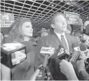  ?? PHELAN M. EBENHACK/AP FILE ?? Florida Gov.-elect Ron DeSantis answers questions from reporters with his wife Casey, left, after he was declared the winner of the election at his party on Nov. 6.