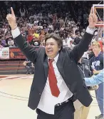  ?? GREG SORBER/JOURNAL ?? Española Valley coach Richard Martinez celebrates his first state championsh­ip in 2011 in the Pit. The Sundevils’ also won the state tourney this year under Martinez.