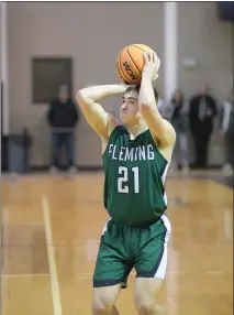  ?? KARIANNE DONNELSON — OTSPORTSCH­EK ?? Fleming High School’s Nolan Japp takes a shot during the Wildcats’ 53-42loss to Peetz Feb. 25, 2023.