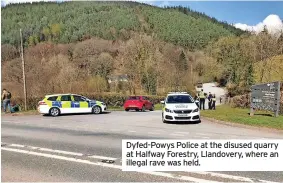  ?? ?? Dyfed-powys Police at the disused quarry at Halfway Forestry, Llandovery, where an illegal rave was held.