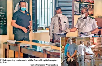  ??  ?? PHIs inspecting restaurant­s at the Dutch Hospital complex in Fort.
Pix by Sameera Weeraseker­a