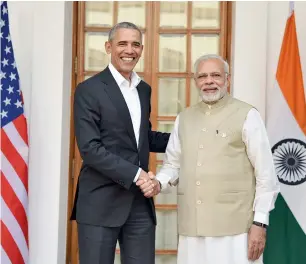  ?? PTI ?? Prime Minister Narendra Modi with Barack Obama in New Delhi on Friday. — Barack Obama,