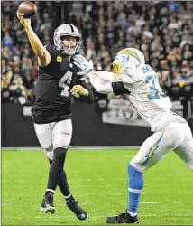  ?? David Becker Associated Press ?? DEREK CARR (4) and the Raiders come to SoFi Stadium on Sept. 11 in a rematch of last season’s Week 18 overtime thriller.