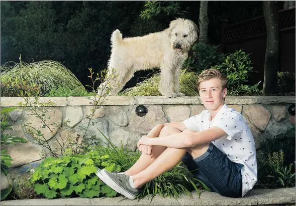  ?? GERRY KAHRMANN/PNG ?? After suffering a concussion sustained while playing soccer, Colin Dierker was ordered to give his brain a rest for two weeks: No school, no sports, no computer, no TV. He eventually spent 10 weeks recuperati­ng at home in Surrey with the family dog, Kai.