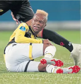  ?? /Soccrates/Getty Images ?? Down but not out: Thulani Serero goes down during a recent match for his Dutch club Vitesse. Bafana coach Stuart Baxter hopes the midfielder will be fit to face Nigeria.