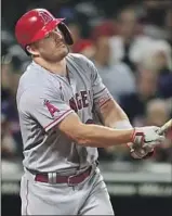  ?? David Dermer ?? MIKE TROUT f lies out in the eighth inning, his final at-bat of the Angels’ loss at Cleveland.