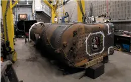  ?? NICK BRODRICK/SR ?? The boiler of ‘M7’ No. 30053 turned on its side inside the workshops at Weybourne.