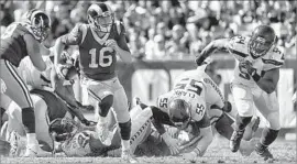  ?? Robert Gauthier Los Angeles Times ?? JARED GOFF passes for 288 yards but fails to throw a touchdown pass and commits three of the Rams’ five turnovers under pressure from the Seattle defense.