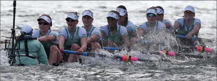  ??  ?? They sink it’s all over: The Cambridge women’s crew almost go under in very choppy river conditions during yesterday’s Boat Race. They lost the race by more than 24 lengths