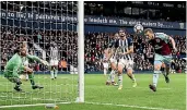  ?? AP ?? Chris Wood stoops to head home Burnley’s winning goal at West Bromwich Albion.
