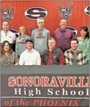  ?? Michael Baron ?? Sonoravill­e senior Grayson Boley poses for a picture with family, Sonoravill­e coaches and administra­tors during a signing ceremony at Sonoravill­e High School on Monday, Nov. 18.