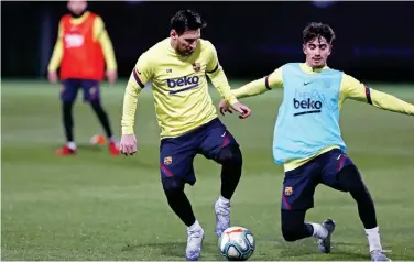  ?? Courtesy: Barcelona website ?? ↑ Barcelona players attend a training session on Friday.