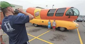  ??  ?? The Oscar Mayer Wienermobi­le will be in the Memphis area over the weekend, making six stops before it leaves town on Monday night. Stop by for a photo, a wiener whistle and coupons. DAN YOUNG / DAILY HERALD MEDIA