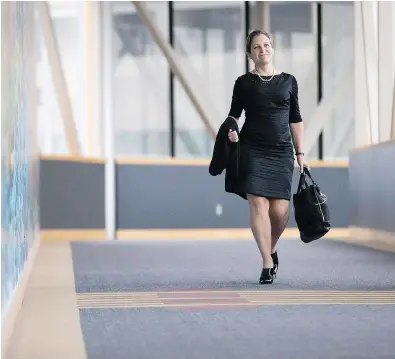  ?? GEOFF ROBINS / THE CANADIAN PRESS ?? Foreign Affairs Minister Chrystia Freeland arrives for a cabinet retreat in London, Ont., on Thursday. The meeting comes a day after the loonie plunged after speculatio­n that President Trump is poised to pull the U.S. out of NAFTA.