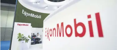  ?? ?? Delegates meet at the Exxon Mobil booth during the LNG2023 conference, Vancouver, Canada, July 11, 2023.