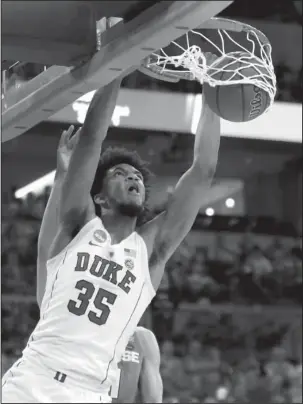  ?? The Associated Press ?? BLUE BLOOD: Duke’s Marvin Bagley III dunks during the second half of Friday’s Midwest Regional semifinal win over Syracuse in Omaha, Neb.