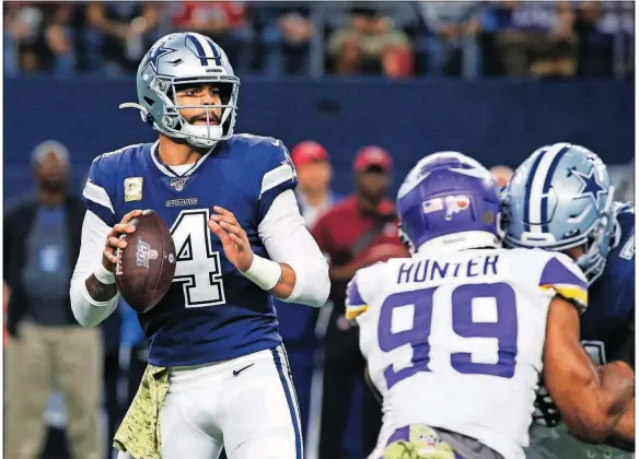  ?? [THE ASSOCIATED PRESS] ?? Cowboys QB Dak Prescott has 1,098 yards passing over three games, beating the franchise record for that span set nine years ago by Tony Romo (1,064).