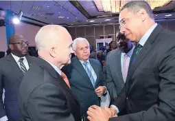  ?? RUDOLPH BROWN/PHOTOGRAPH­ER ?? Prime Minister Andrew Holness (right) in discussion with (from left) Senator Pearnel Charles Jr, minister of state in the ministry of national security; Raymond Kelly, former NYPD commission­er; General Rosso José Serrano, security and internatio­nal...