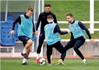  ?? Reuters ?? England’s James Ward-Prowse, Kyle Walker, Kieran Trippier and Jordan Henderson during training session. —