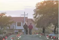  ?? REUTERS ?? Solar lights mark burial sites on Cowessess First Nation, where a recent search found 751 unmarked graves from the former Marieval Indian Residentia­l School near Grayson, Sask., joining hundreds more unmarked graves found at other sites across Canada.