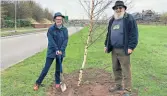  ?? PHOTO: LHCRT ?? Lichfield u3a chairman Judith Thorpe joins Peter Buck, engineerin­g director of Lichfield and Hatherton Canals Restoratio­n Trust, at the Falkland Road canal site to help plant the donated trees.