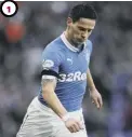  ??  ?? Playing for Rangers during the club’s journey in the lower leagues.
The big day: Lifting the Scottish Cup in 2012.
Black was booed by some sections of the Scottish support at Easter Road. The smile tells you he wasn’t too fazed .