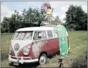  ?? PICTURE: REUTERS ?? A fan sits atop a Kombi to catch a glimpse of cyclists in the Tour de France Stage 5 from Lorient to Quimper, in France, this week.