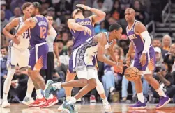  ?? CHRISTIAN PETERSEN/GETTY IMAGES ?? The Suns will face De'Aaron Fox and the Kings twice in the next 10 games.