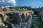  ?? ?? A view of excavation­s of the Roman town Herculaneu­m, buried by Vesuvius in 79 CE