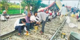  ?? HT PHOTO ?? Gujjars have said they will vacate railway tracks only after getting 5% reservatio­n.
