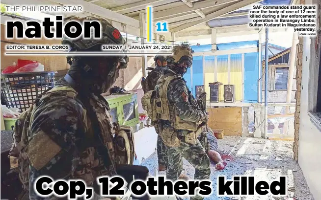  ?? JOHN UNSON ?? SAF commandos stand guard near the body of one of 12 men killed during a law enforcemen­t operation in Barangay Limbo, Sultan Kudarat in Maguindana­o yesterday.