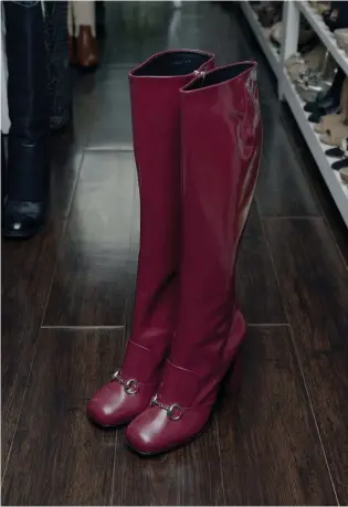  ??  ?? R Gucci knee-high boots