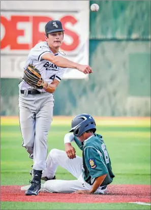  ?? GREG Davis/special to The Saline Courier ?? Bryant Black Sox second baseman Slade Renfrow attempts to turn a double play in a game earlier this week. The Black Sox began 2-0 in a tournament in Springfiel­d, Missouri.