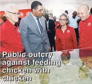  ?? RUDOLPH BROWN/PHOTOGRAPH­ER ?? Prime Minister Andrew Holness, (second left,) Karl Hendrickso­n (left), chairman of CB Group; LoriAnn Lyn, CB Group managing director; and Matthew Lyn, CB Group director, look at ‘The Nest’, CB Group’s multibilli­on-dollar investment in St Catherine...