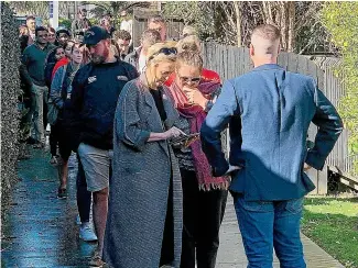  ?? ?? Open homes can be busy, though that has been changing in some areas. People queued up at this open home in Auckland’s Royal Oak suburb.