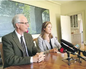  ?? SARAH PETRESCU, TIMES COLONIST ?? Bid committee chairman David Black and team member Suzanne Weckend, a two-time Commonweal­th Games athlete, at Wednesday’s announceme­nt at Black’s Oak Bay home.