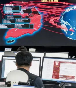  ?? — AP ?? In this May 15 photo, employees watch electronic boards to monitor possible ransomware cyberattac­ks at the Korea Internet and Security Agency in Seoul, South Korea.