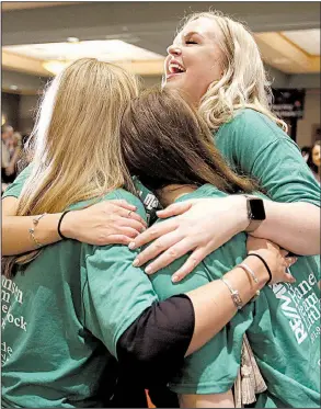  ?? Arkansas Democrat-Gazette/THOMAS METTHE ?? University of Arkansas for Medical Sciences students (from left) Shannon Petrus, Caitlin Claridge and Jasmine Haller celebrate their matches Friday in Little Rock. Petrus’ general-surgery residency will be at UAMS. For their residencie­s in...