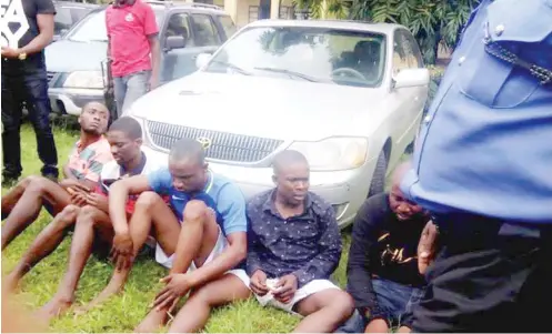  ??  ?? Suspected killers of Catholic Priest Rev. Fr. Cyriacus Onunkwo during their parade by the police in Imo State