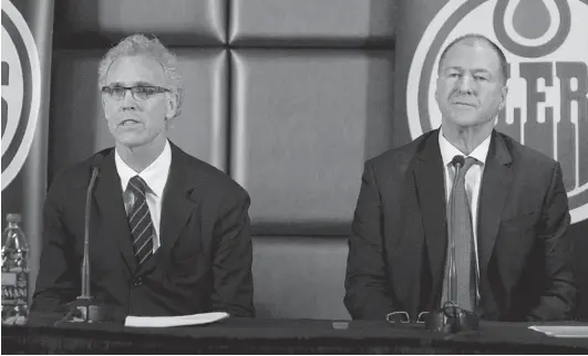  ?? GREG SOUTHAM/ POSTMEDIA NEWS ?? New Edmonton Oilers GM Craig MacTavish, left, and team president Kevin Lowe listen to questions during a news conference Monday in which Lowe announced the firing of Steve Tambellini, with MacTavish replacing him. Also hired was Scott Howson, who was...