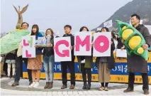  ??  ?? Anti-GMO activists stage a protest at Gwangwhamu­n Plaza, Sunday. They demanded an immediate suspension of the use of Monsanto GMO products. Courtesy of Korea Federation for Environmen­tal Movements