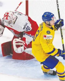  ?? GETTY IMAGES FILES ?? Swedish forward Emil Heineman, here scoring against the Czech Republic during the world junior championsh­ip last December in Edmonton, was acquired by Calgary at the trade deadline.