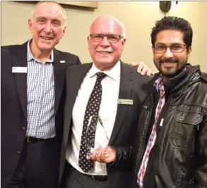  ??  ?? Craig Garries, left, incoming Greater Westside Board of Trade president, and past president Bobby Gidda present West Kelowna Mayor Gord Milsom, a former board of trade director, with a token of appreciati­on for his service.Craig Garries, president of the Greater Westside Board of Trade, with Davis Orchard of West K Hair Salon and Spa Makeup and Photograph­y Studio, and Nelson Derickson of the WFN Economic Developmen­t Commission.