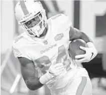  ?? PHELAN M EBENHACK/AP ?? Dolphins wide receiver Isaiah Ford is back with the team and ready to contribute.